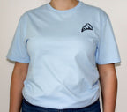 White t-shirt with a small pizza embroidery on the chest worn by a person against a plain background